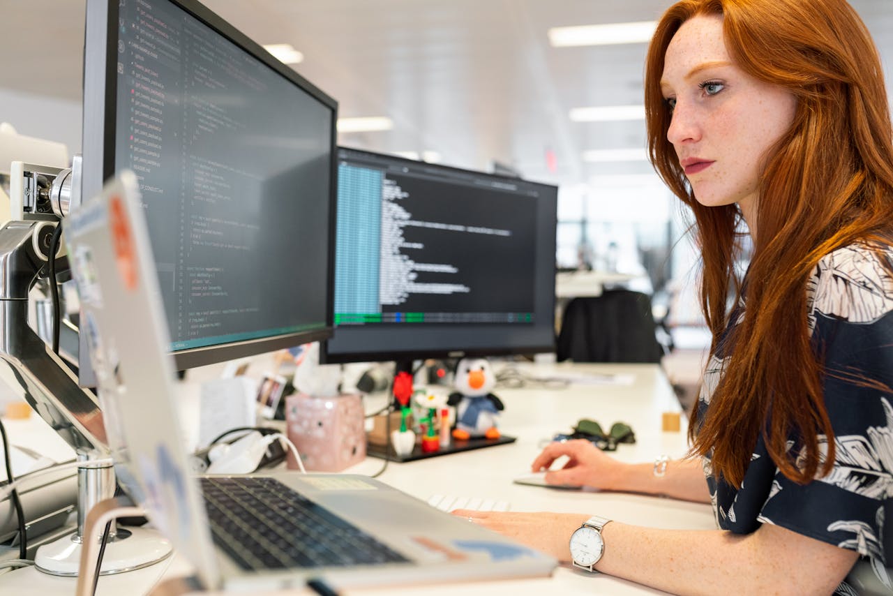 girl working on dev ops with services providing like globalouts.
